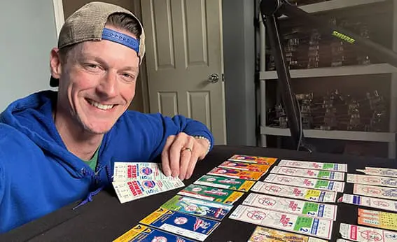 David sorting ticket stubs